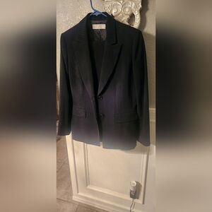 Tahari women's size 12 black pin stripped suit